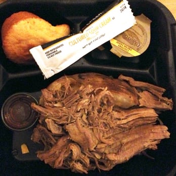 Stroud's Barbeque - BBQ Baked Potato Thursday Special. Look closely for a nice-size baked potato under that heaping mound of pulled pork. - Barbeque Near Me - Franklin, Tennessee