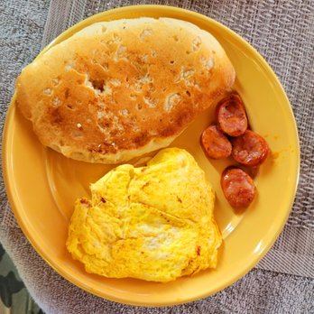 Hilo Bay Oceanfront Bed And Breakfast - Eggs, macadamia nut pancakes and Portuguese sausage - Bed & Breakfast Near Me - Hilo, Hawaii