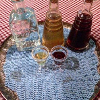 Calhou - Complimentary digestifs(rubbing alcohol, honey heaven, and cough syrup)..if you really want to burn that esophagus, opt for the clear one! - Portuguese Near Me - Lagos, 20
