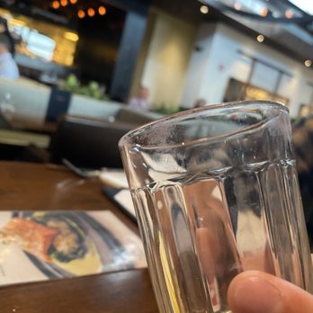 Earls Kitchen + Bar - dirty water glasses with lipstick stains - Cocktail Bars Near Me - Denver, Colorado