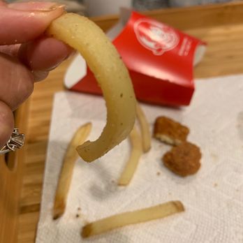 Wendy's - a person peeling a banana peel - Fast Food Near Me - Herriman, Utah