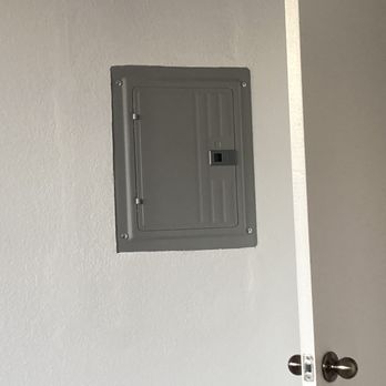 Creative Living Painting - After the Patch and Paint job.  Raised, large, plaster rectangle around the Upgraded Subpanel where it doesn't belong. - Painters Near Me - Glendale, California