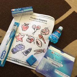 Pacific Family Dental - Some of the goodies I received from my cleaning plus a cute coloring sheet my daughter colored during her check up.