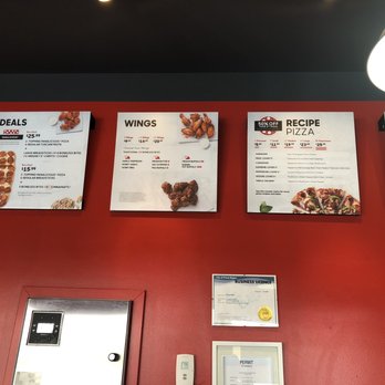 Pizza Hut - menus on a red wall - Pizza Near Me - Prince Rupert, British Columbia Pizza Hut - menus on a red wall - Pizza Near Me - Prince Rupert, British Columbia