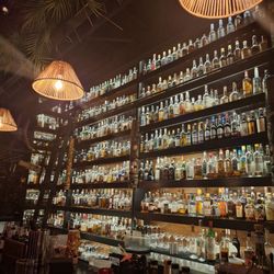 Rum Row Tiki Bar - Drink wall. Great vibes