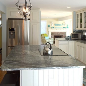 Casa Pro Builders - a kitchen with a large island - General Contractors Near Me
