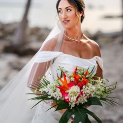 Epic Events by Booth - "Say 'I do' with a burst of tropical elegance--where orchids, heliconia, and roses meet paradise.
#tropicalbouquet #destinationwedding
