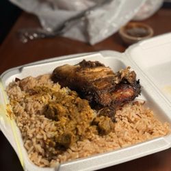 Bull Top Taste Restaurant - Jerk chicken with rice and a topping