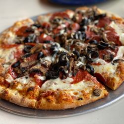 New Vintage Bar & Grill - Medium pizza. Mushroom, pepperoni, and olive. Yummy.
