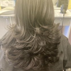 Look at these layers guys! Usha is the best. My daughter never went back to any other person after she did her hairs.