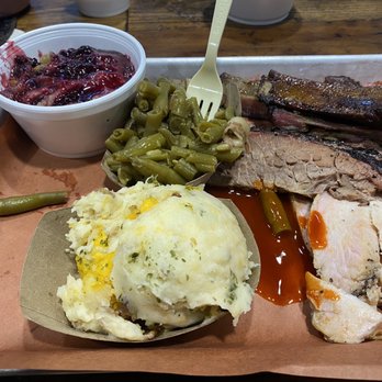 C&J Barbeque - Great experience. 3 meat plate with two sides - 20 bucks. Cobbler with Blue Bell ice cream and an iced tea was extra. - Barbeque Near Me - Bryan, Texas