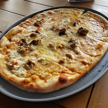 Back 9 Golf & Entertainment - Meatball and parm cheese pizza I believe? That's all I saw and tasted. This was my favorite dish with the loaded tots behind. - Bars Near Me - Indianapolis, Indiana