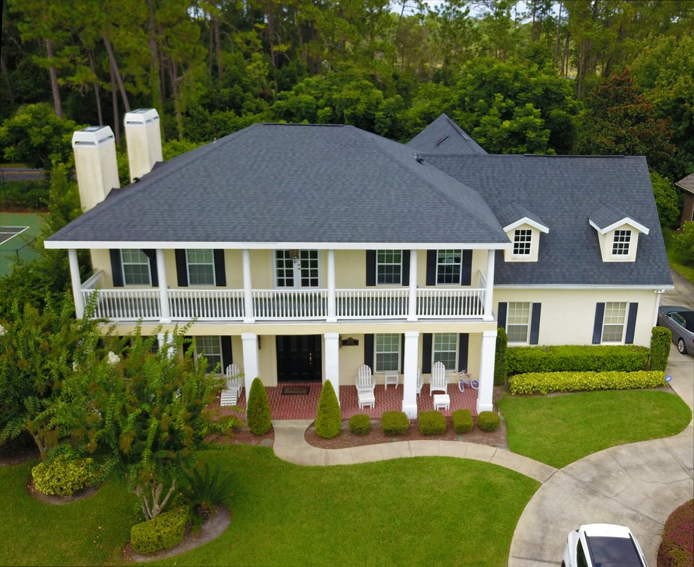 Slide of Roof Pros USA