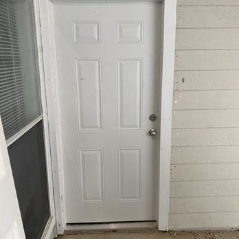 Simpson Solutions - New front door and door frame - Handyman Near Me