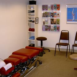 Tyks Chiropractic Center - Exam and adjusting room 1 with comfortable, top of the line Lloyd hydraulic adjusting tables.