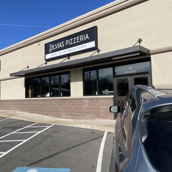 Sylvia’s Pizzeria - Outside in parking lot. - Pizza Near Me - Pine Bluff, Arkansas Sylvia’s Pizzeria - Outside in parking lot. - Pizza Near Me - Pine Bluff, Arkansas