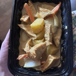 Yellow curry with fried tofu (no choice on fried/not). $12.
