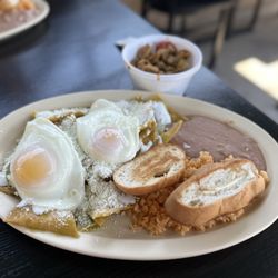 Alma Delias - Delicious green chilaquiles with chicken on the side (extremely flavorful, must try!)