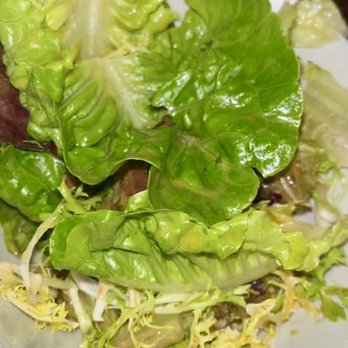 Kabawa - Sides with mains- Salad- Citrus dressing. Nice reprieve from all the rich food - Caribbean Near Me - New York, New York