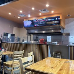 Chop House Gyro - Waiting for our food to get cooked... it's freshly made. Cooks behind the grill
