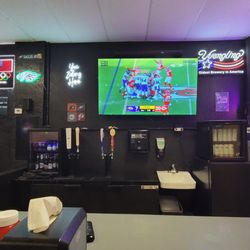 Dough Bros Pizza - They have a small bar in here if you want to relax and watch the game.