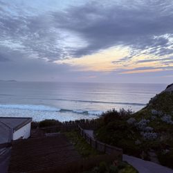 watergate bay holiday park - Surfers and sunset