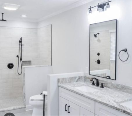 The Rooter Guys Plumbing Logo