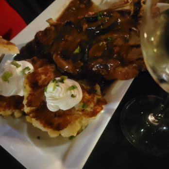 Angelo’s Chop House - T bone steak with mushroom sauce - Steakhouses Near Me - Monroe, Michigan