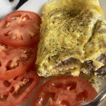 Mena's Palace - Cajun Tasso Omelette - Breakfast & Brunch Near Me - New Orleans, Louisiana Mena's Palace - Cajun Tasso Omelette - Breakfast & Brunch Near Me - New Orleans, Louisiana