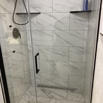 JS Helping Hand - I did bathtub on one side and a shower on the other,with a slope. - Handyman Near Me
