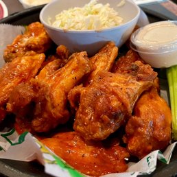 Hot Buffalo wings and a side of slaw