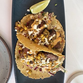 Tommy Bahama Marlin Bar - Steak tacos- so flavorful with a bit of spice - New American Near Me - Charlotte, North Carolina Tommy Bahama Marlin Bar - Steak tacos- so flavorful with a bit of spice - New American Near Me - Charlotte, North Carolina