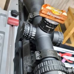 Red River Gun Works - Putting on a new scope for a customer.