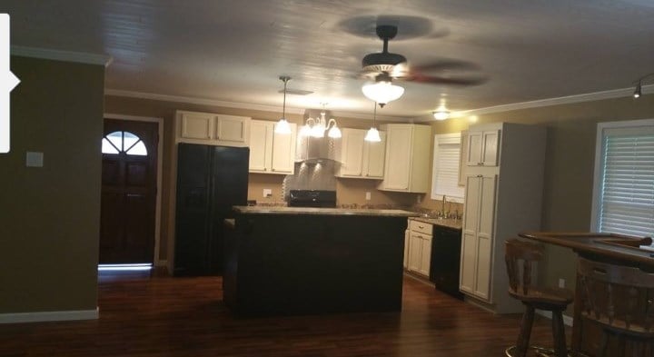 Slide of Randy's Total Renovations