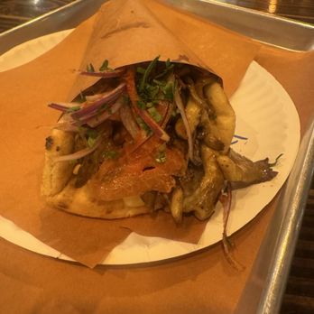 Tziki - Tahini Wild Mushroom Souvlaki - In a Greek Pita. - Greek Near Me - New York, New York Tziki - Tahini Wild Mushroom Souvlaki - In a Greek Pita. - Greek Near Me - New York, New York
