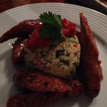 Dean Swift - Merguez sausages with couscous - Pubs Near Me - London, XGL Dean Swift - Merguez sausages with couscous - Pubs Near Me - London, XGL