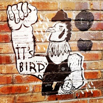 H Mart - Paramus - a brick wall with a drawing of a man in a cowboy hat - Grocery Near Me - Paramus, New Jersey