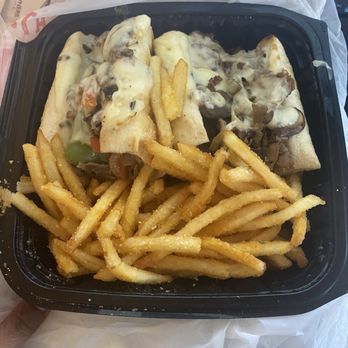 Empire Pizza - Cheesesteak with garlic Romano & herb fries - Pizza Near Me - Charlotte, North Carolina Empire Pizza - Cheesesteak with garlic Romano & herb fries - Pizza Near Me - Charlotte, North Carolina
