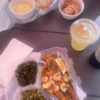 Li'l Dizzy's Cafe - Bottom: Grilled Trout with lemon shrimp sauce, collards and green beans. - Cajun/Creole Near Me - New Orleans, Louisiana Li'l Dizzy's Cafe - Bottom: Grilled Trout with lemon shrimp sauce, collards and green beans. - Cajun/Creole Near Me - New Orleans, Louisiana