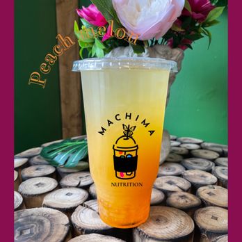 Maxima Nutrition - a drink in a plastic cup on a table - Juice Bars & Smoothies Near Me - Lexington, Kentucky