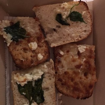 Domino's Pizza - four slices of bread with cheese and spinach - Pizza Near Me - San Antonio, Texas Domino's Pizza - four slices of bread with cheese and spinach - Pizza Near Me - San Antonio, Texas