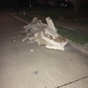 McFall Masonry & Construction - Rubble left on the street for days with no precaution taken for those who live in the neighborhood. - General Contractors Near Me - Argyle, Texas