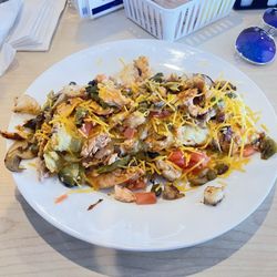 Huskers Cafe - Huskers Omelet with shrimp / salmon / peppers / mushroom / tomatoes / cheddar cheese