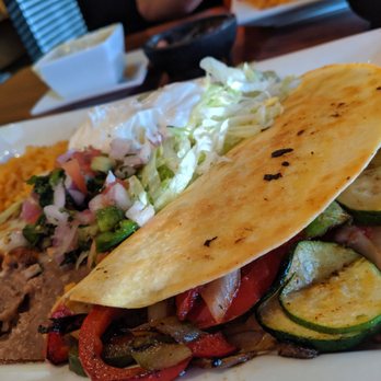 Hidalgo Mexican Bar and Grill - Generous portions. Quesadilla stuffed with vegetables - Mexican Near Me - Urbandale, Iowa Hidalgo Mexican Bar and Grill - Generous portions. Quesadilla stuffed with vegetables - Mexican Near Me - Urbandale, Iowa