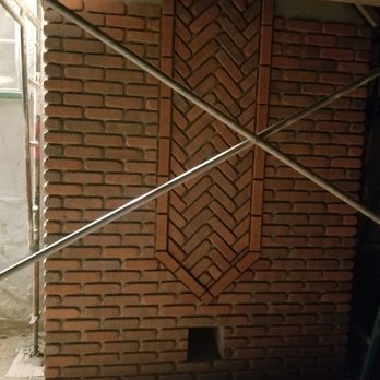 Boston Brick & Stone - A photo of the decorative herringbone detail and the ash chute. - Masonry/Concrete Near Me - Pasadena, California
