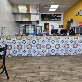 Roasty Chicken - Inside establishment - setup with 1 table, my meals were to-go. - Salad Near Me - Houston, Texas Roasty Chicken - Inside establishment - setup with 1 table, my meals were to-go. - Salad Near Me - Houston, Texas