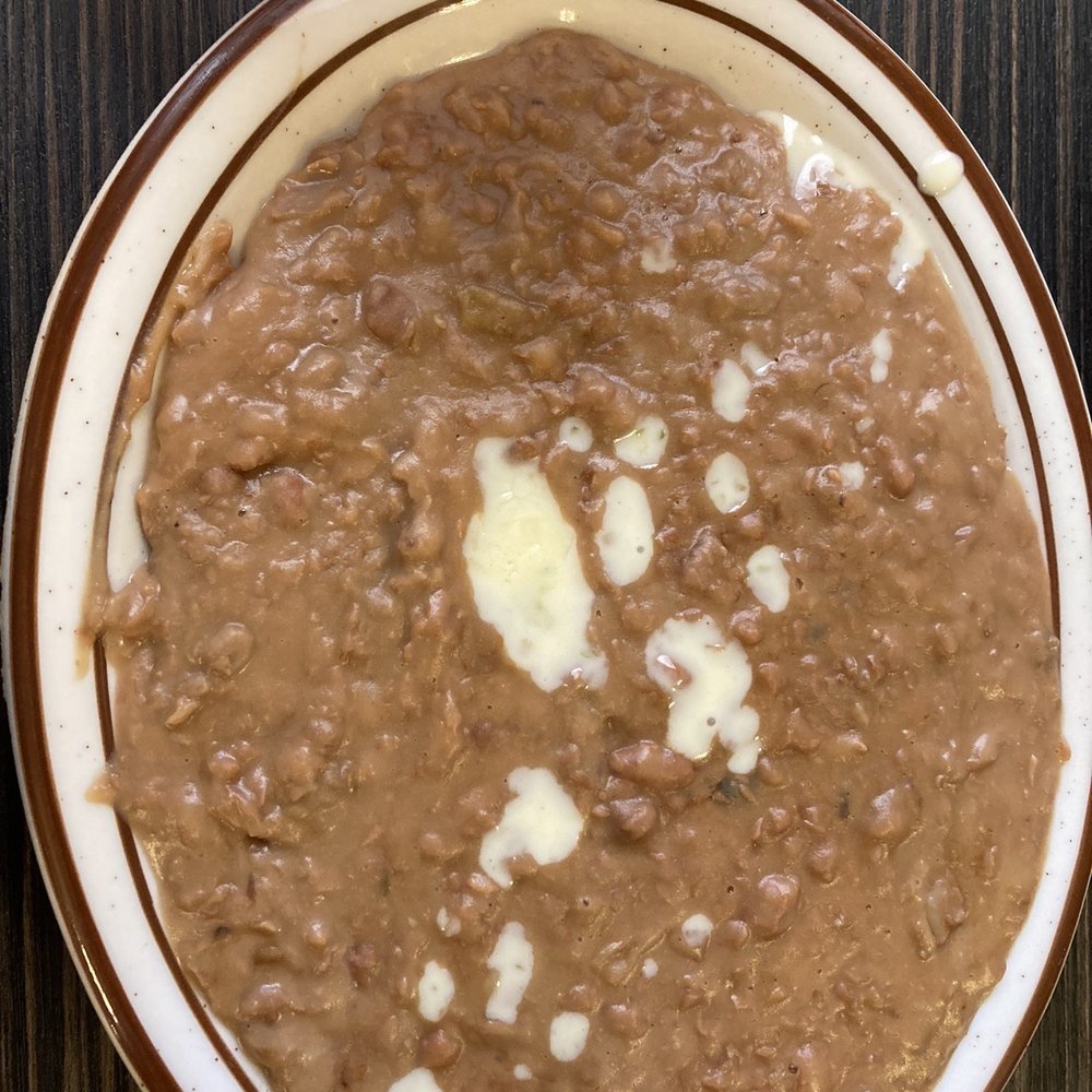 El Tequila - a bowl of black beans with melted butter - Mexican Near Me - Broken Arrow, Oklahoma