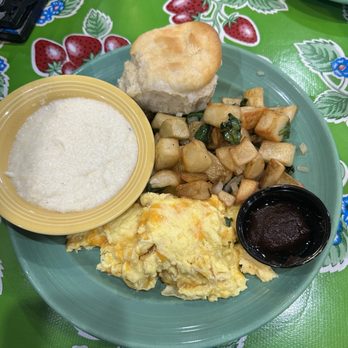 The Flying Biscuit Cafe - Scrambled eggs, grits, potatoes and biscuit - Breakfast & Brunch Near Me - Peachtree Corners, Georgia The Flying Biscuit Cafe - Scrambled eggs, grits, potatoes and biscuit - Breakfast & Brunch Near Me - Peachtree Corners, Georgia