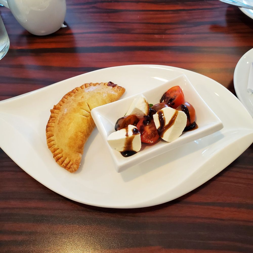 Tomato and mozz with chocolate balsamic glaze, delicious turnover Tomato and mozz with chocolate balsamic glaze, delicious turnover