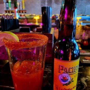 Mezcal Cantina Y Cocina - a drink and a bottle - Mexican Near Me - Riverside, California Mezcal Cantina Y Cocina - a drink and a bottle - Mexican Near Me - Riverside, California